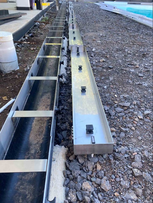 HIDE stainless steel Linear Strip Drain Cover and framework onsite ready to be installed