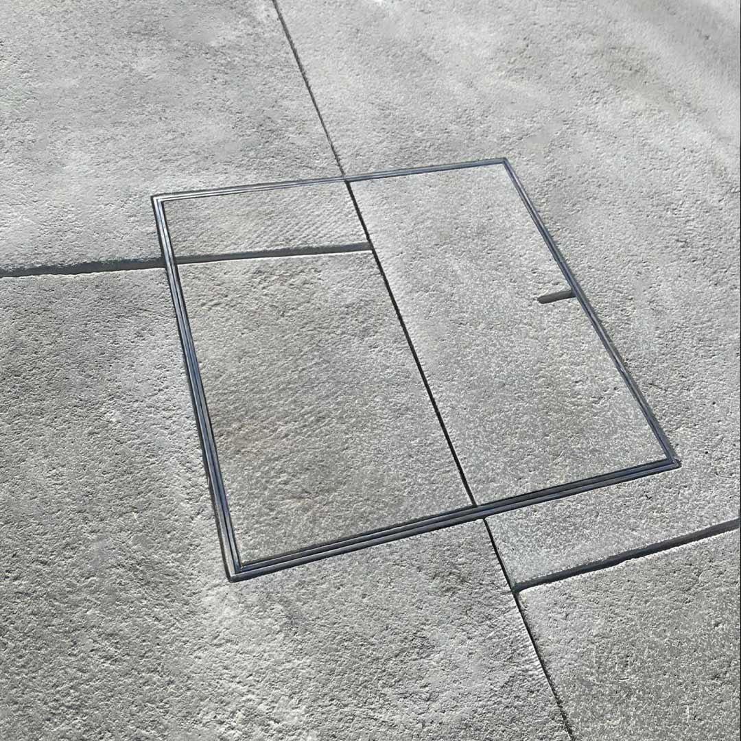 HIDE Access Cover sitting flush with surrounding tile