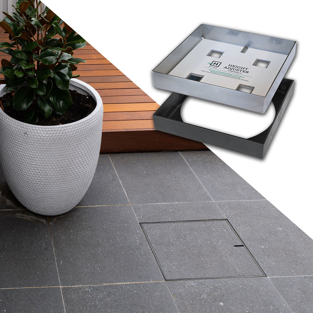 HIDE Charcoal non conductive Combination Access Cover with polymer frame and durable stainless steel lid installed next to swimming pool.