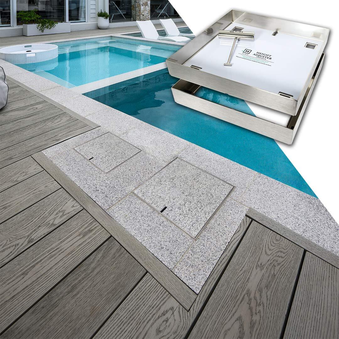 HIDE stainless steel Skimmer Lid and Access Cover with grey tile inlay installed next to swimming pool.