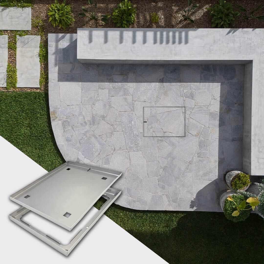 HIDE Rectangle 550x342mm Access Cover in backyard courtyard.